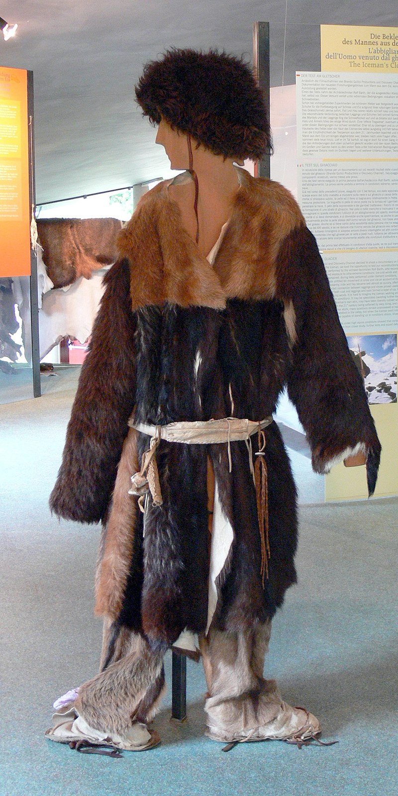 An image of a mannequin wearing a reconstruction of the garments worn by Ötzi the ice man